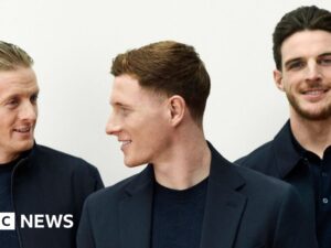 ‘It’s very Bond’: Fashion experts on the England squad’s off-pitch look