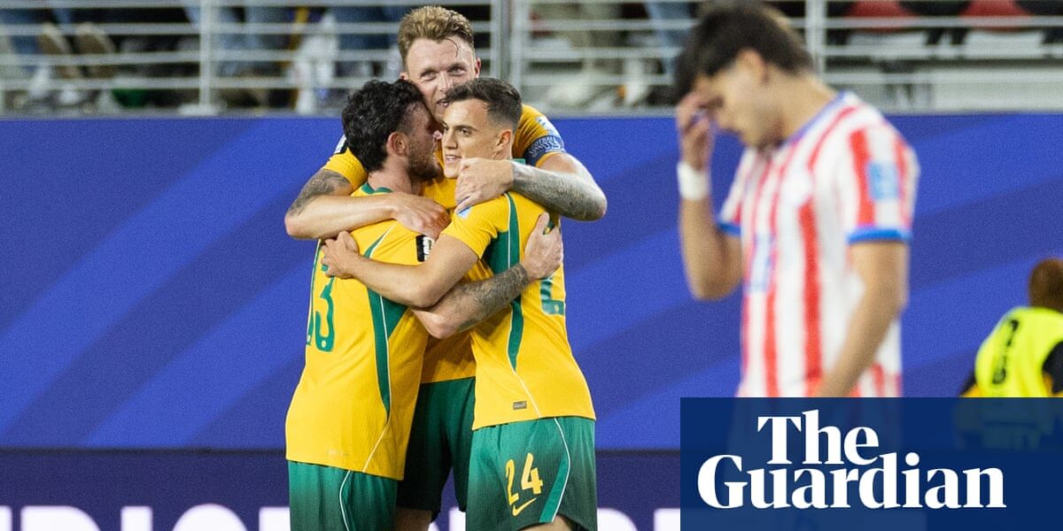 Socceroos secure place in World Cup last 32 after nerve-shredding draw with Paraguay