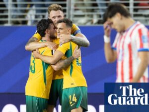 Socceroos secure place in World Cup last 32 after nerve-shredding draw with Paraguay