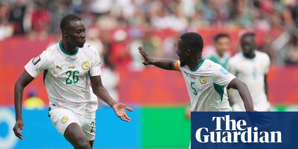 Senegal salvage hopes of World Cup last-32 place with rout of 10-man Iraq
