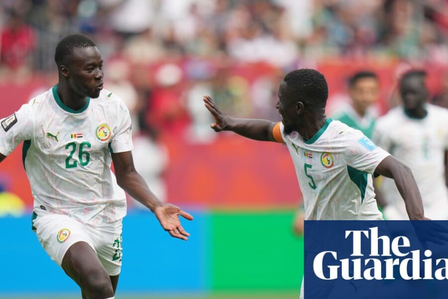 Senegal salvage hopes of World Cup last-32 place with rout of 10-man Iraq