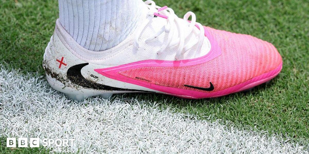 Why are footballers wearing pink boots at the World Cup?