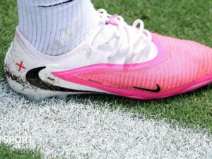 Why are footballers wearing pink boots at the World Cup?