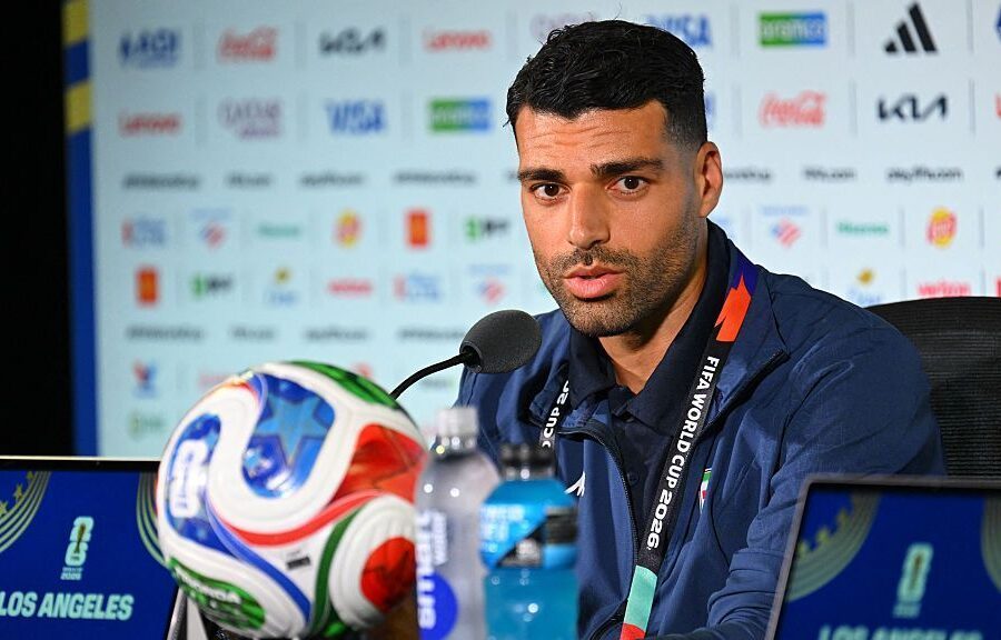 Iran team downplays protests: We aren't political
