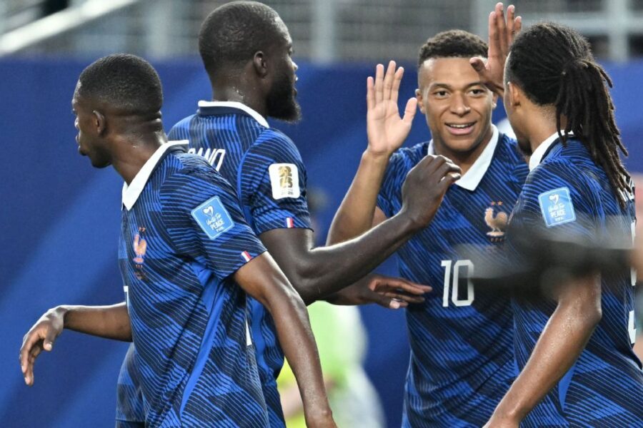 Mbappé makes it rain as storms delay France win