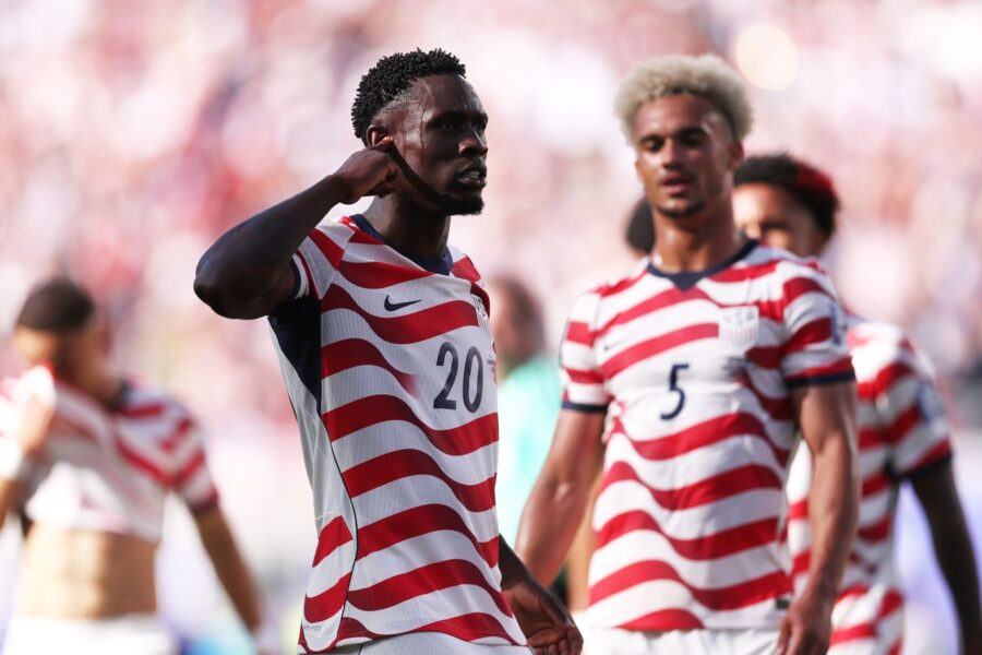 USA reach last 16 as Balogun scores but then sees red